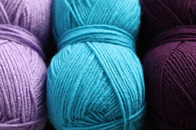 Photo of Many different yarns as background, closeup view