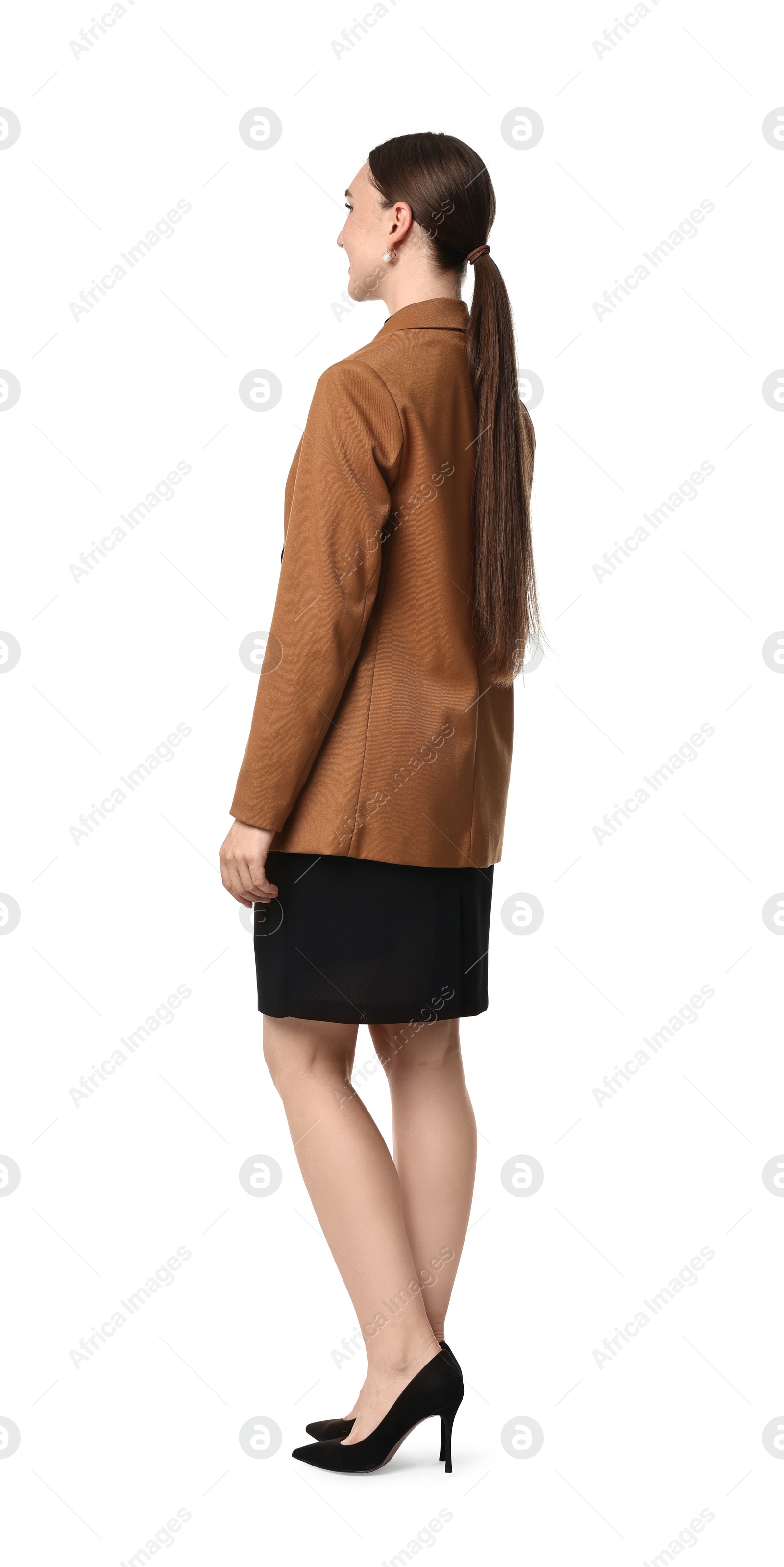 Photo of Beautiful woman in brown jacket and black dress on white background