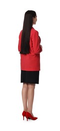 Woman in red jacket and black dress on white background