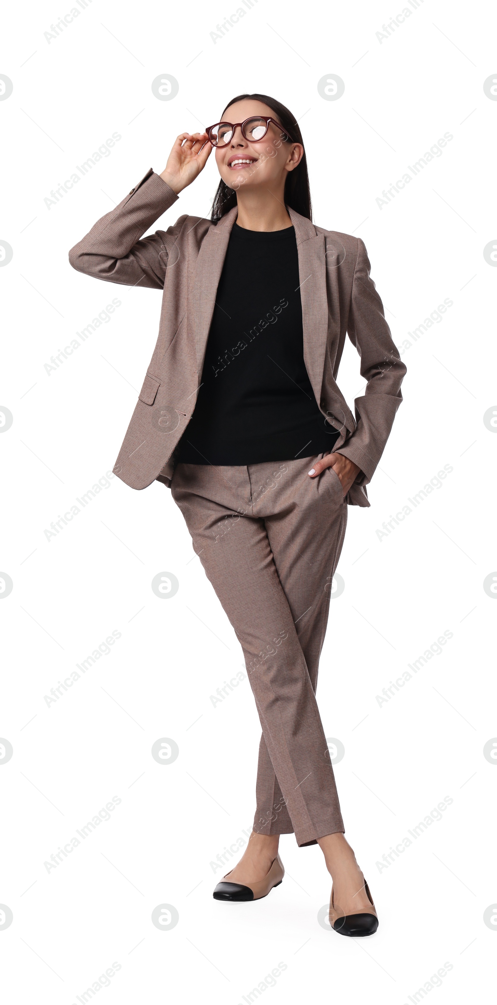 Photo of Beautiful woman in beige suit and glasses on white background