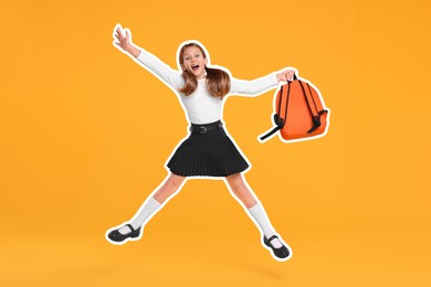 Image of Happy school child with backpack jumping on orange background
