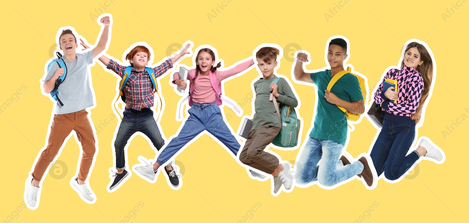 Image of Cheerful school children jumping together on yellow background