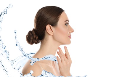 Image of Gorgeous woman and splashes of water on white background