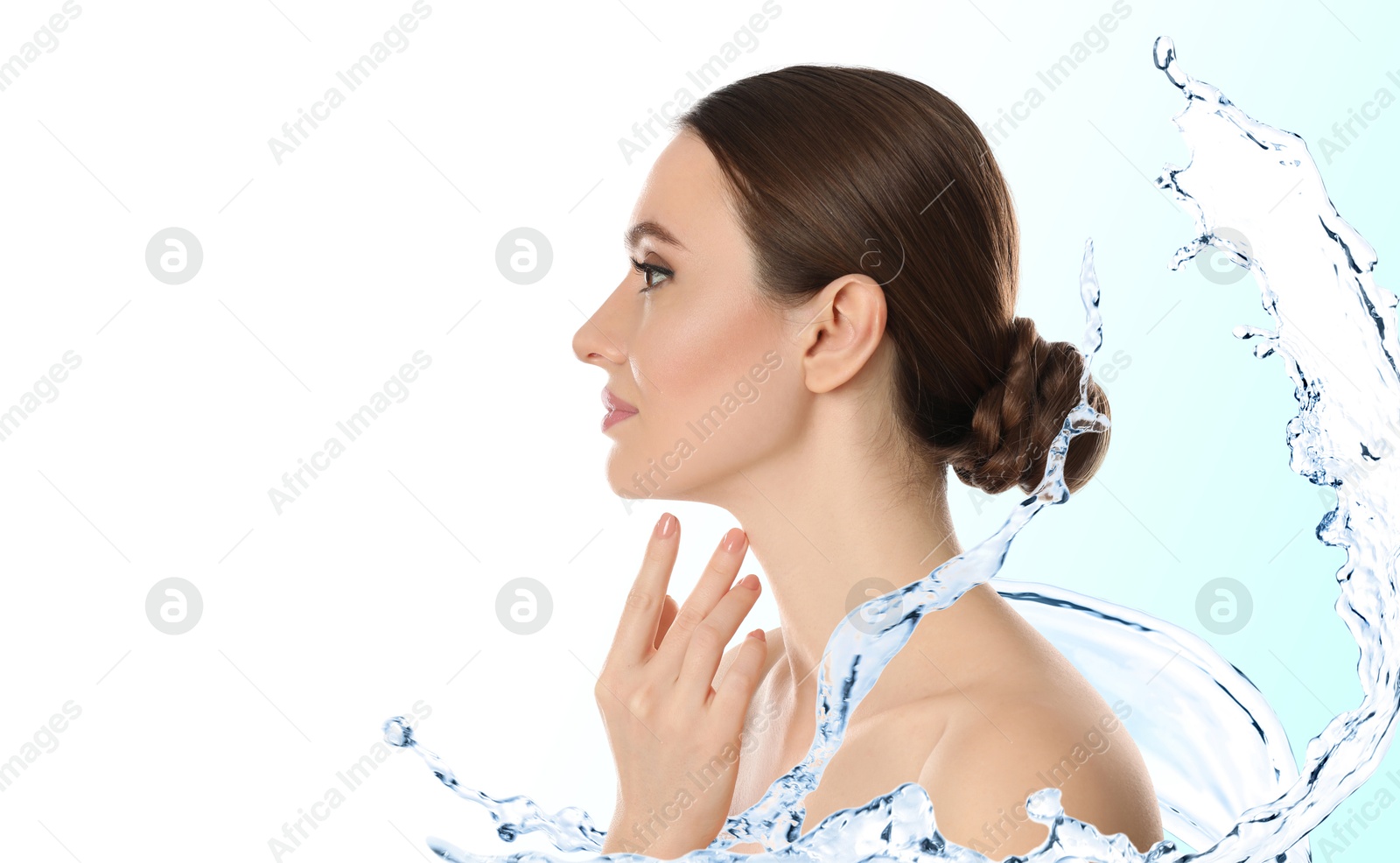 Image of Gorgeous woman and splashes of water on gradient background