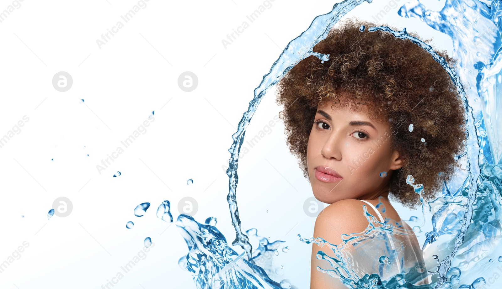 Image of Attractive woman and splashes of water on gradient background