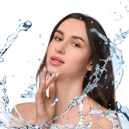 Beautiful woman and splashes of water on white background