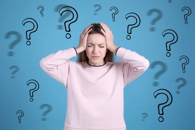 Image of Amnesia. Worried woman and question marks around her on light blue background