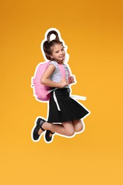 Image of Cute school child with backpack jumping on orange background