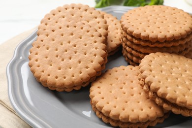 Fresh tasty sandwich cookies on table, closeup