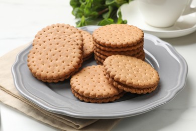 Photo of Fresh tasty sandwich cookies on table, closeup