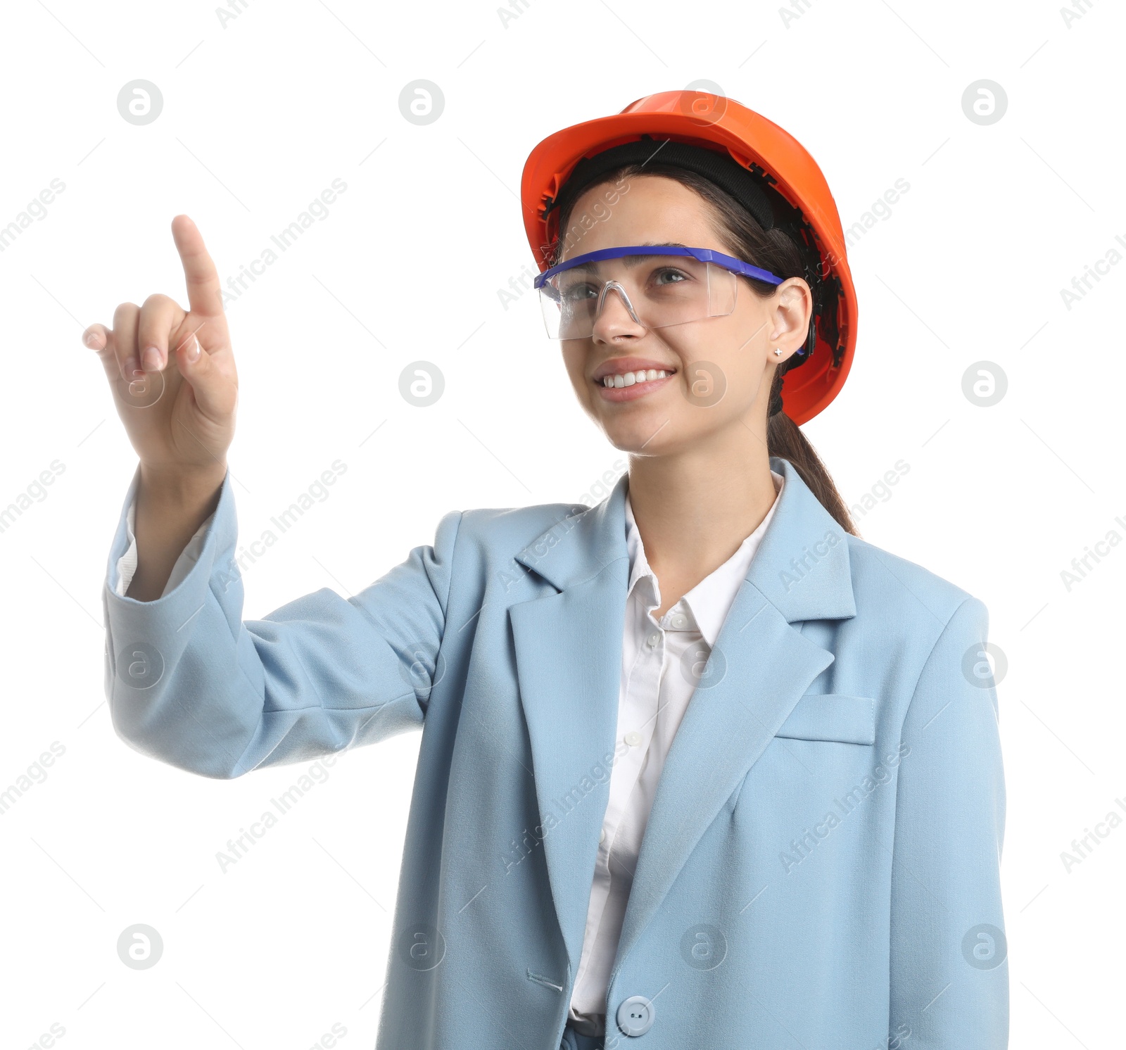 Photo of Engineer in hard hat and goggles on white background