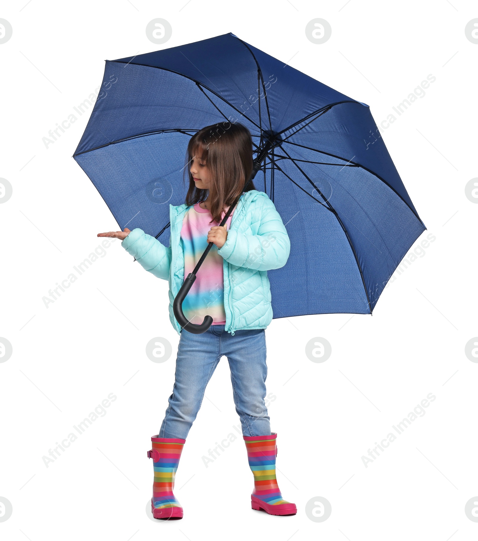 Photo of Cute little girl with blue umbrella on white background