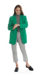 Beautiful woman in stylish green jacket on white background