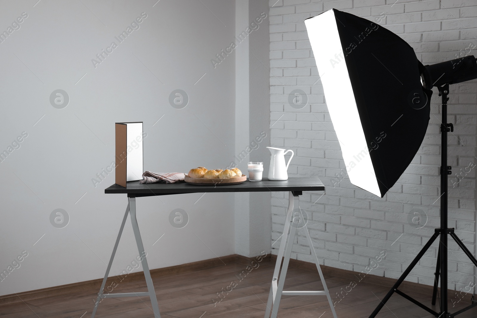 Photo of Shooting food in photo studio with professional lighting equipment