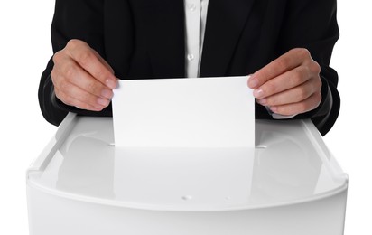 Photo of Woman putting her vote into ballot box against white background, closeup