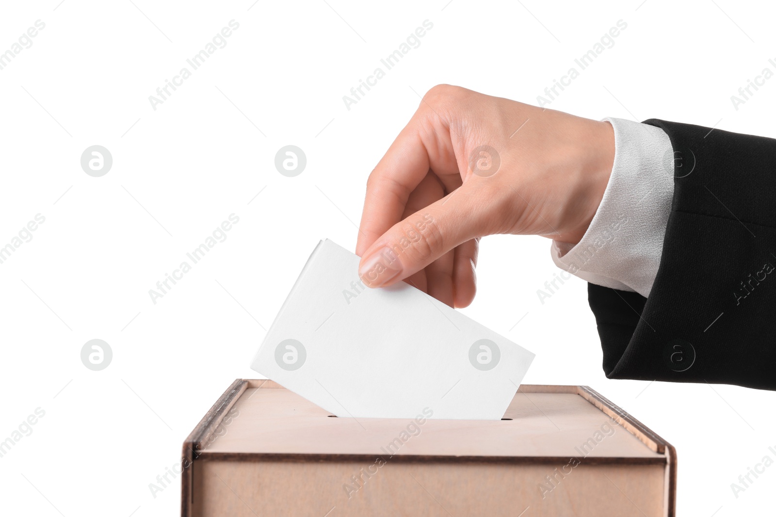 Photo of Woman putting her vote into ballot box against white background, closeup