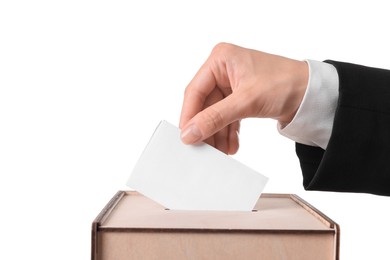 Photo of Woman putting her vote into ballot box against white background, closeup