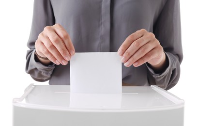 Photo of Woman putting her vote into ballot box against white background, closeup