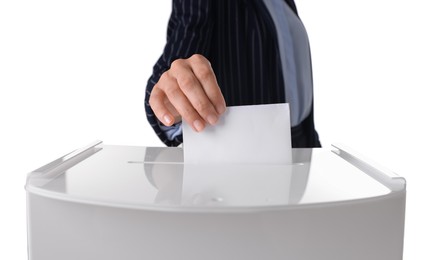 Woman putting her vote into ballot box against white background, closeup