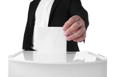 Photo of Man putting his vote into ballot box against white background, closeup