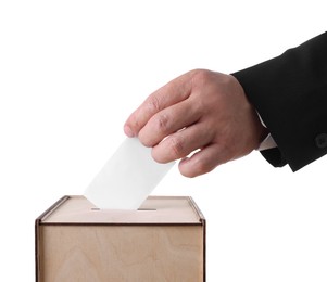 Photo of Man putting his vote into ballot box against white background, closeup