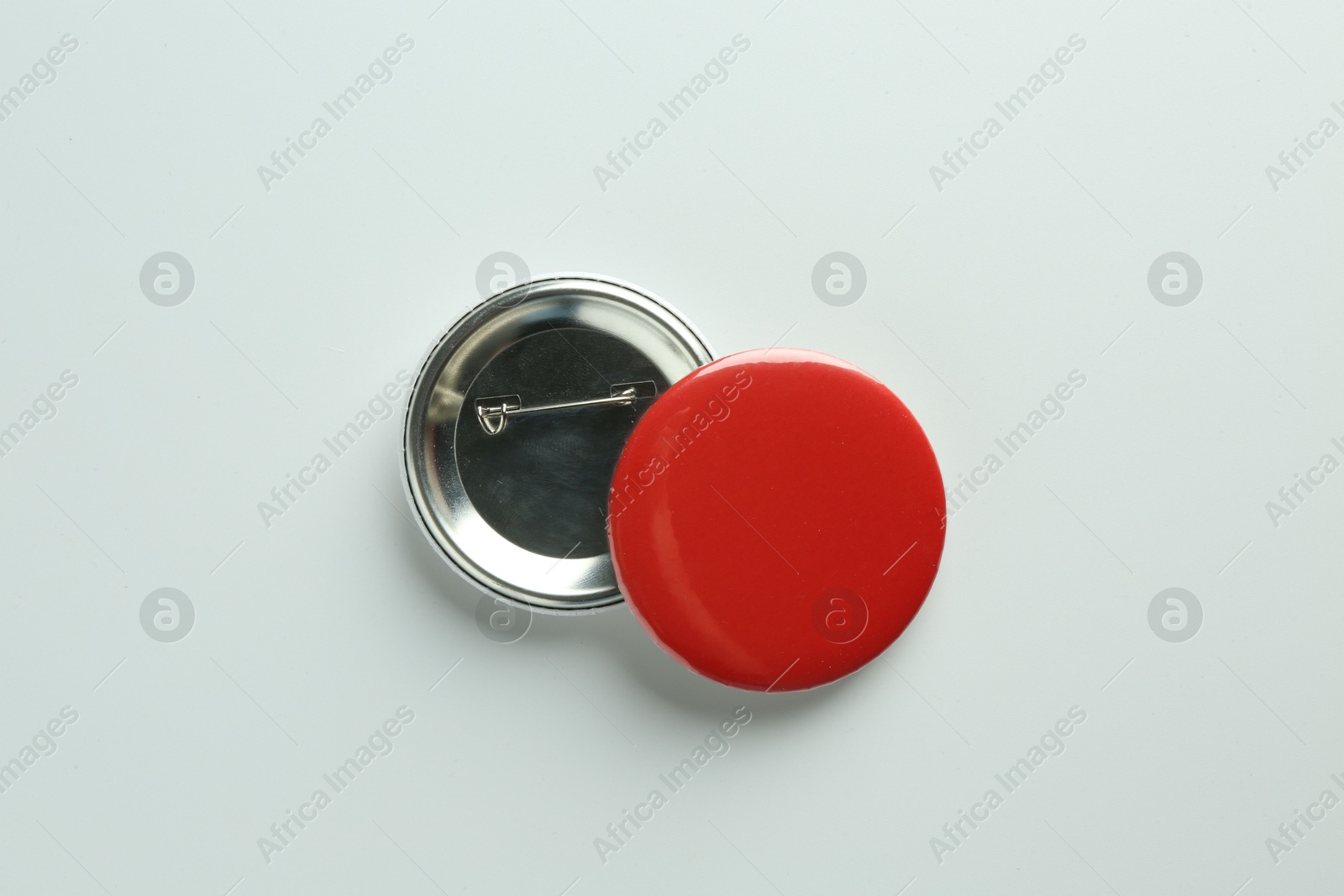 Photo of Button badges on white background, flat lay. Mockup for design