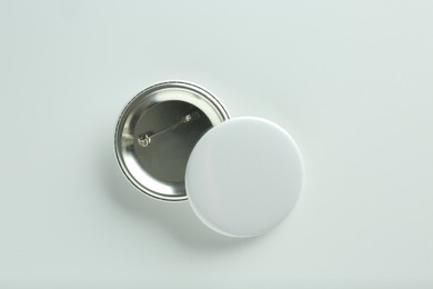 Button badges on white background, flat lay. Mockup for design