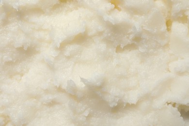 Photo of Natural shea butter as background, top view