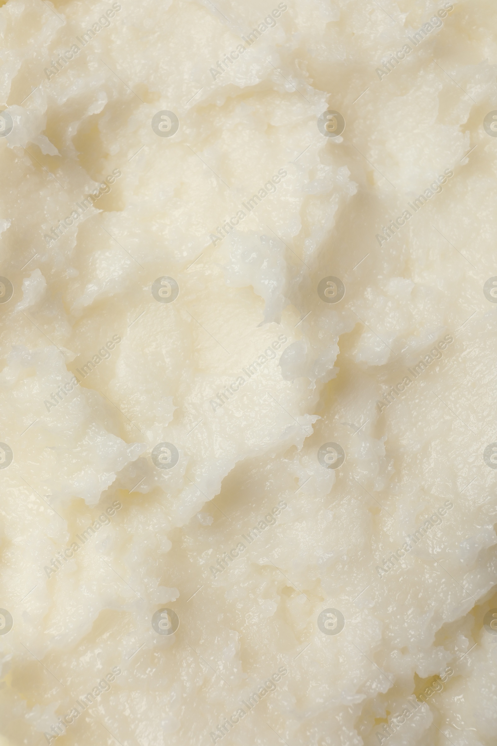 Photo of Natural shea butter as background, top view