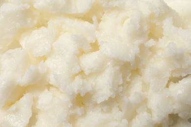 Photo of Natural shea butter as background, top view