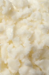 Natural shea butter as background, top view