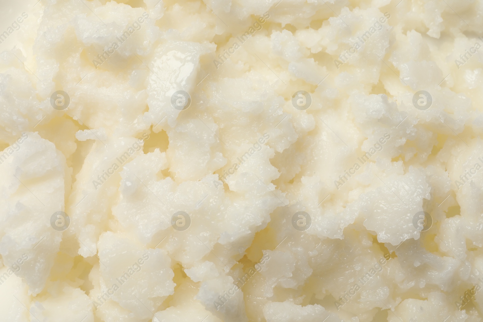 Photo of Natural shea butter as background, top view