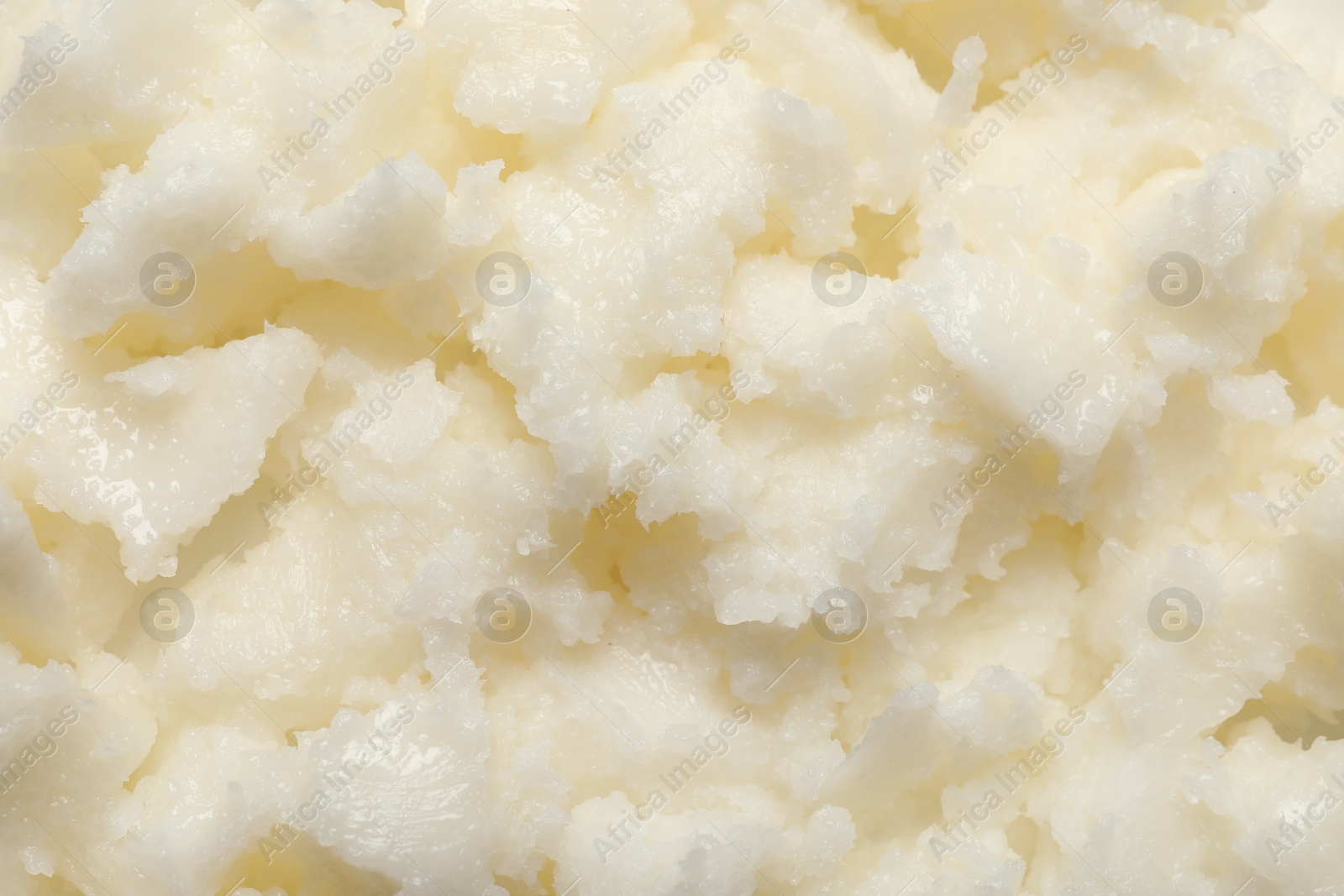 Photo of Natural shea butter as background, top view