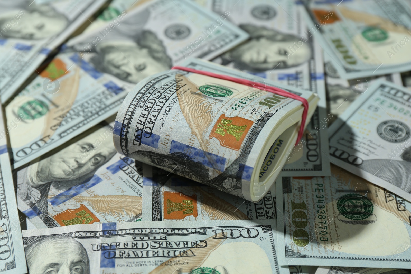 Photo of Many dollar banknotes as background, closeup view