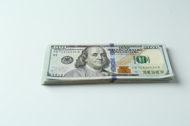 Stack of dollar banknotes on white background