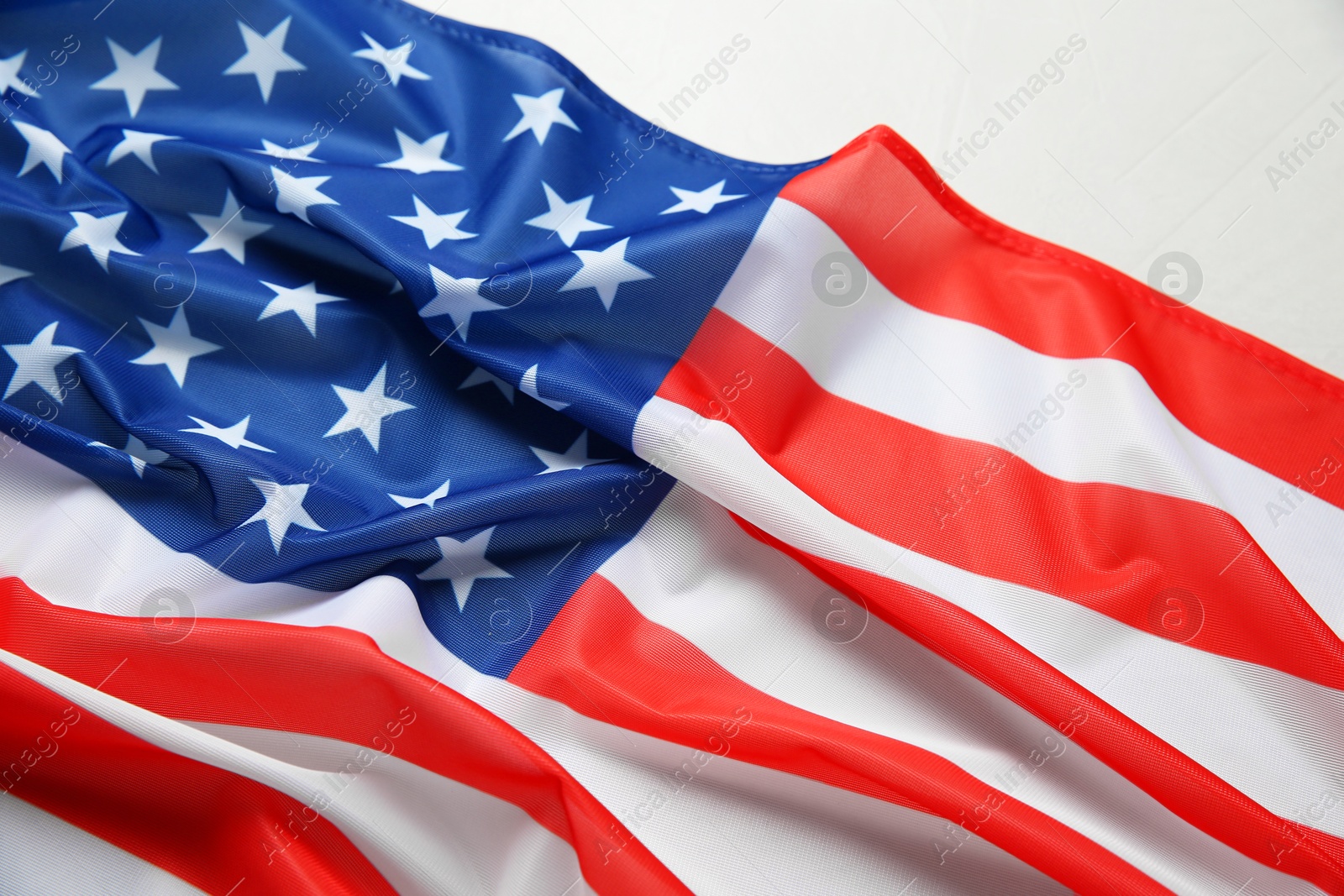 Photo of Flag of USA on white table, closeup