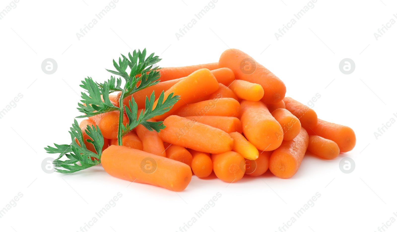 Photo of Baby carrots and green leaf isolated on white