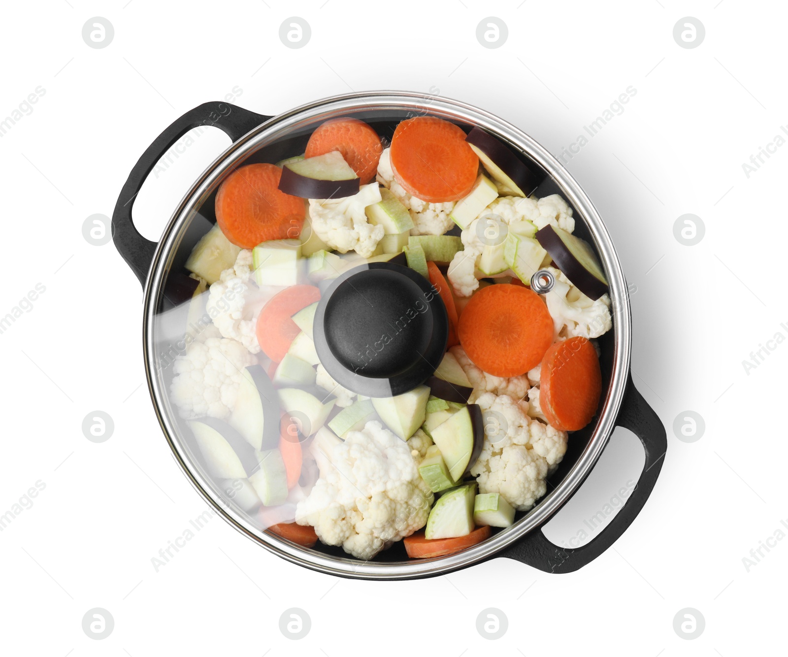 Photo of Cooking stew. Cut raw vegetables in pot isolated on white, top view