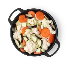 Photo of Cooking stew. Cut raw vegetables in pot isolated on white, top view