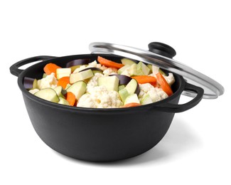 Cooking stew. Cut raw vegetables in pot isolated on white