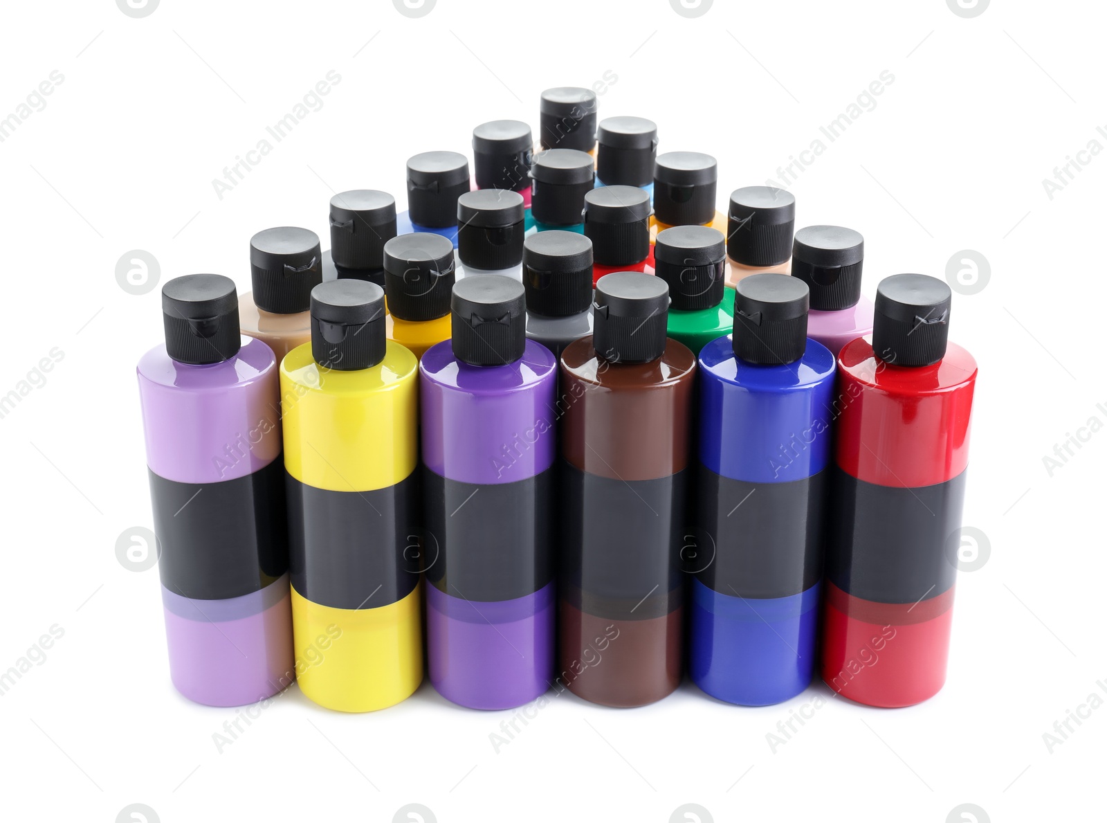 Photo of Acrylic paints of different colors in bottles isolated on white