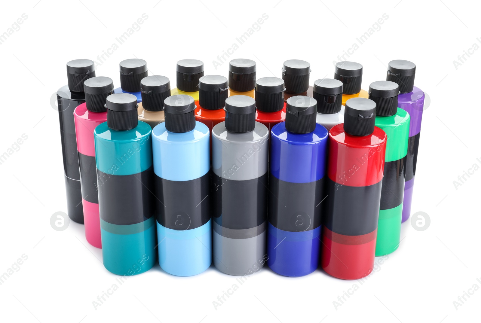 Photo of Acrylic paints of different colors in bottles isolated on white