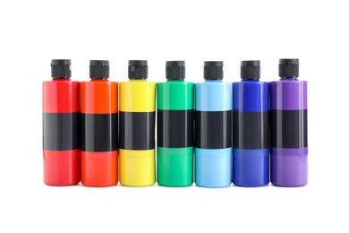 Acrylic paints of different colors in bottles isolated on white