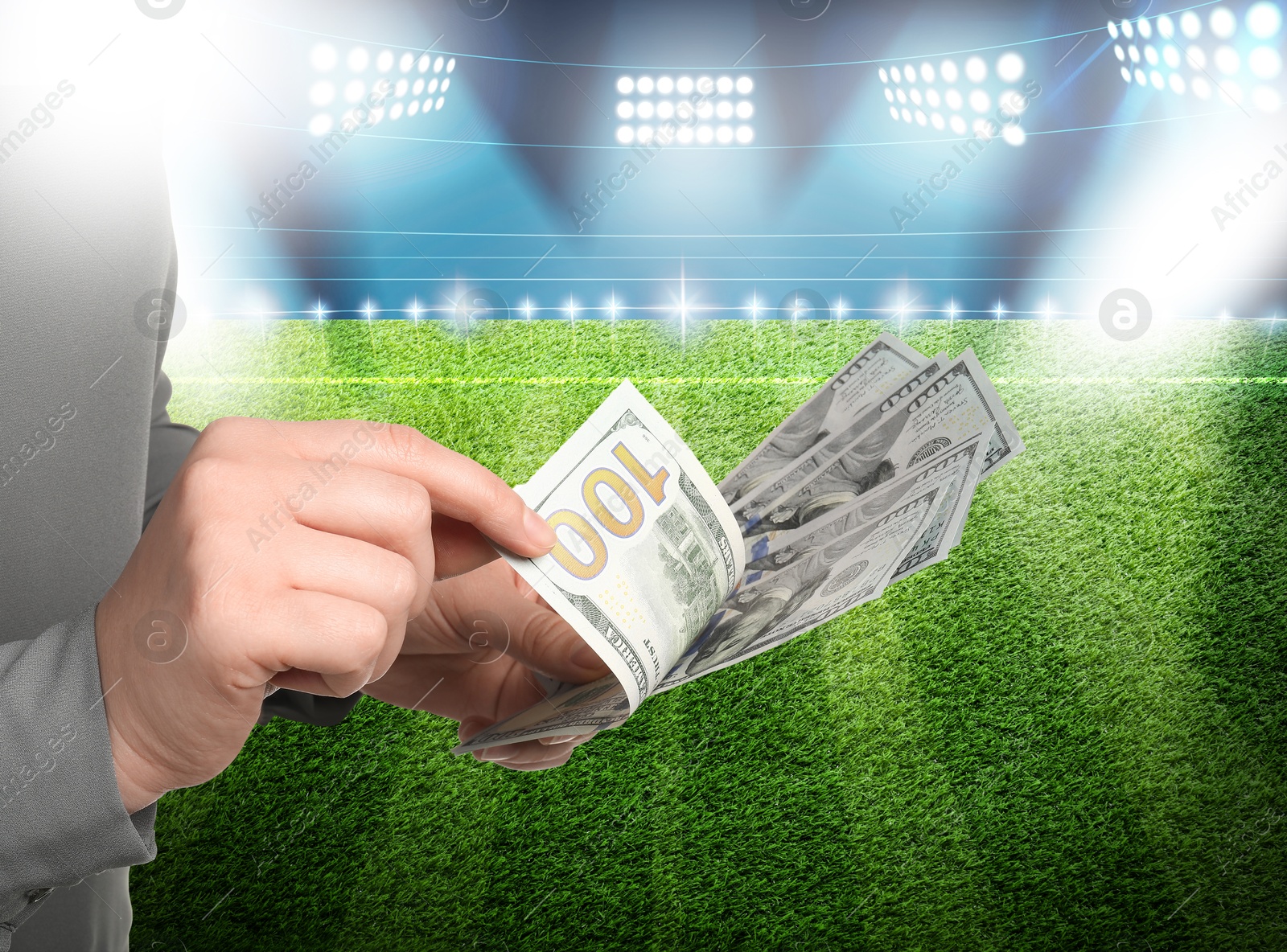 Image of Man counting money at stadium, closeup. Space for text