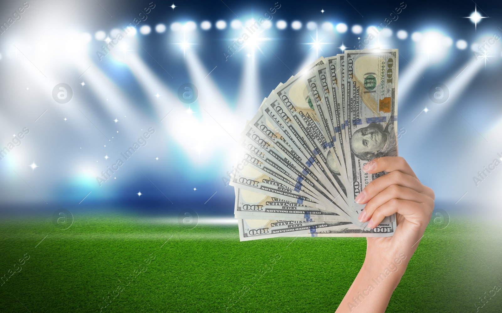 Image of Woman holding money at stadium, closeup. Space for text