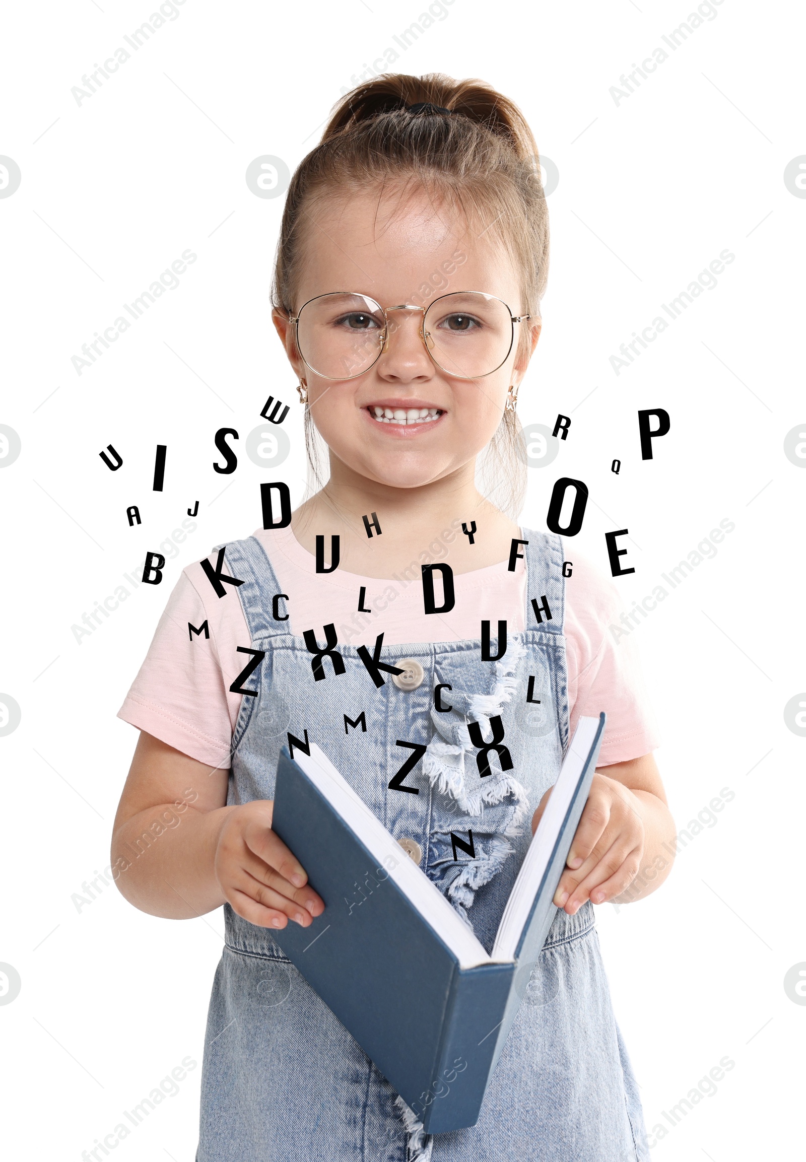 Image of Smiling girl with glasses and book on white background. Letters flying out of book