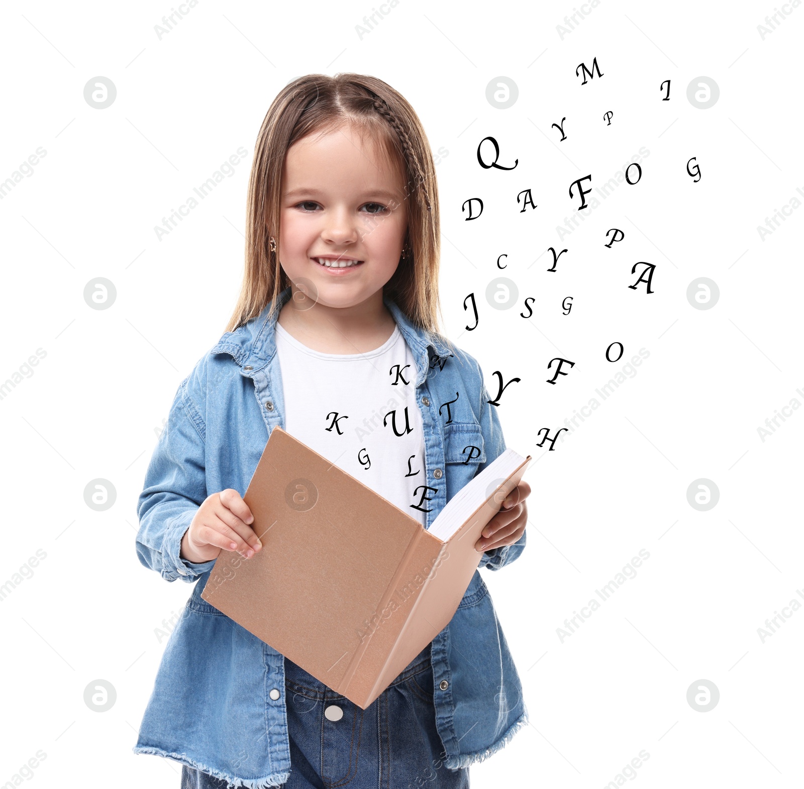 Image of Smiling girl with book on white background. Letters flying out of book