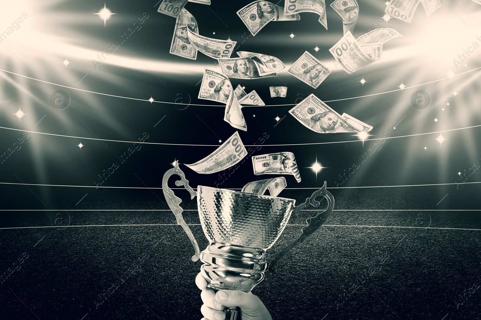 Image of Man holding gold trophy cup and money in air at stadium, closeup. Color toned