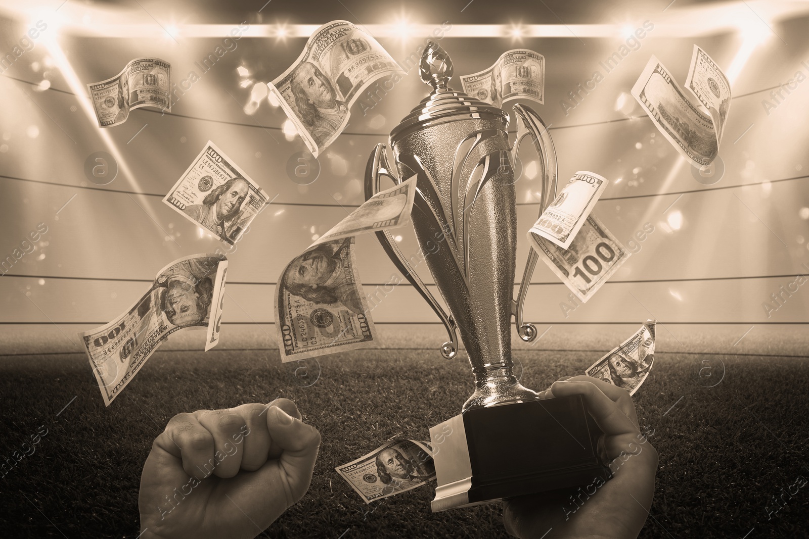 Image of Man holding gold trophy cup in money rain at stadium, closeup. Color toned