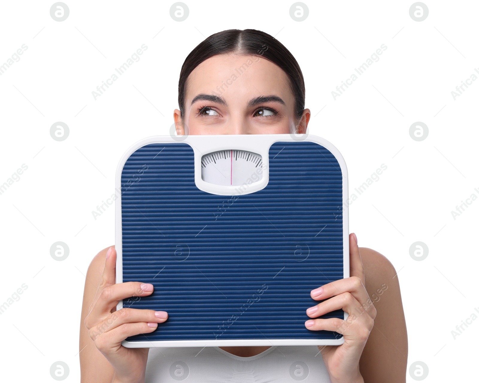 Photo of Diet and weight loss concept. Young woman with floor scale on white background